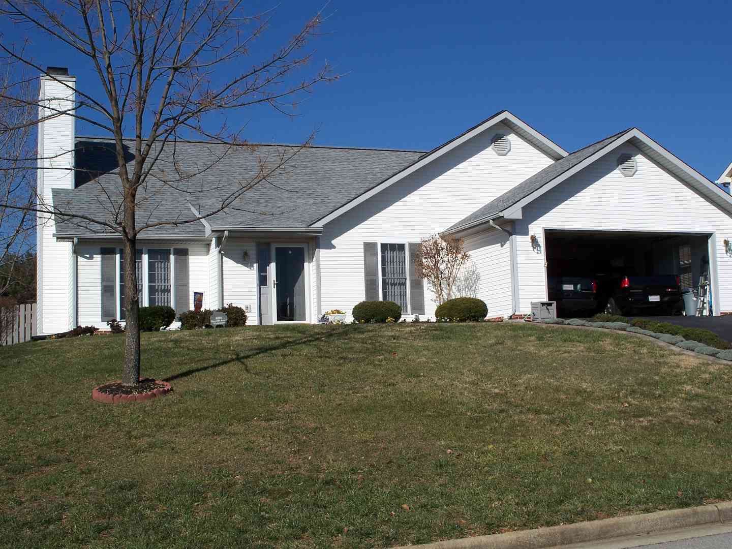 Rancher with two car garage and gray roof